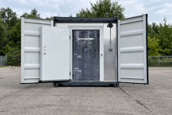 North Pro Equipment dual compartment refrigerated container exterior with cargo doors open showing walk-in cooler and freezer access