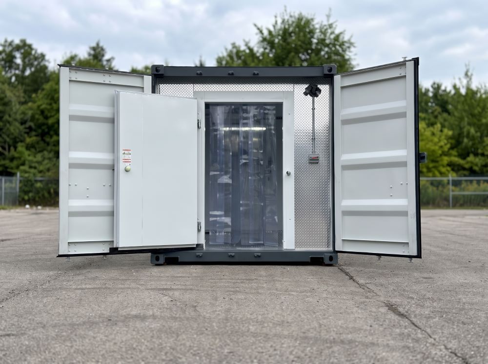 North Pro Equipment dual compartment refrigerated container exterior with cargo doors open showing walk-in cooler and freezer access